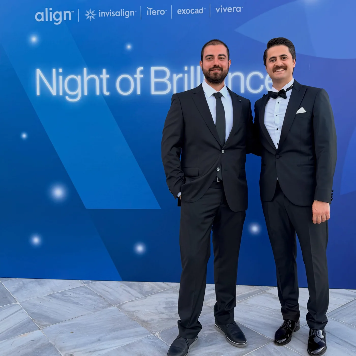 Dr Enes Yusuf Gönül and Dr Ahmet Murat Artuç at the Invisalign Night of Brilliance 2026 event
