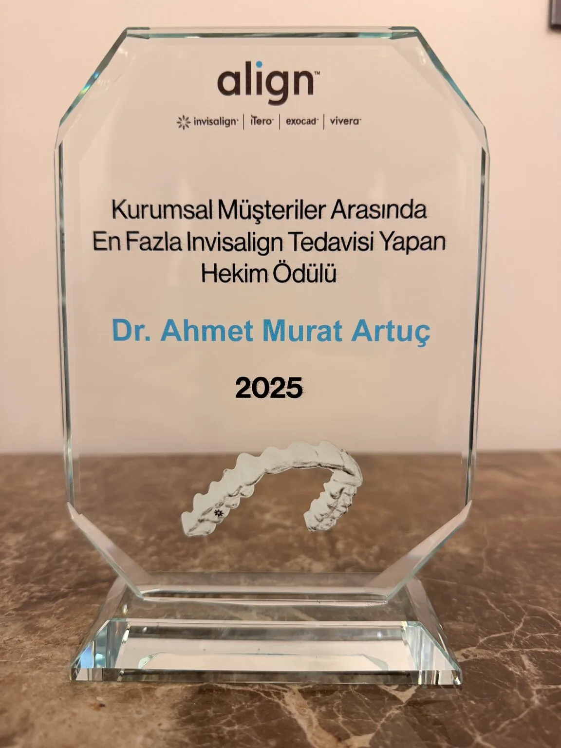 Align Technology glass award plaque for the highest number of Invisalign treatments among corporate customers, Dr Ahmet Murat Artuç, 2025