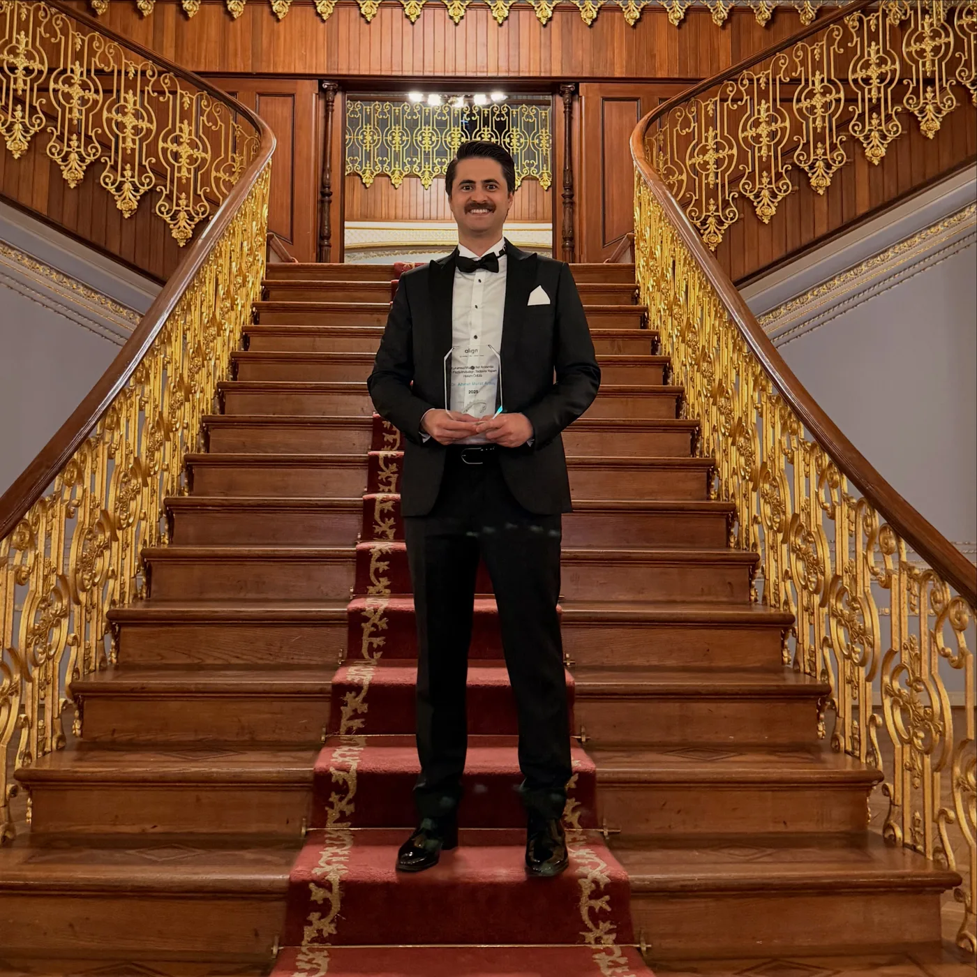 Invisalign award plaque for the doctor completing the highest number of cases among corporate customers, Dr Ahmet Murat Artuç, Night of Brilliance 2026